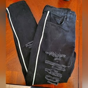Black distressed high rise skinny jeans